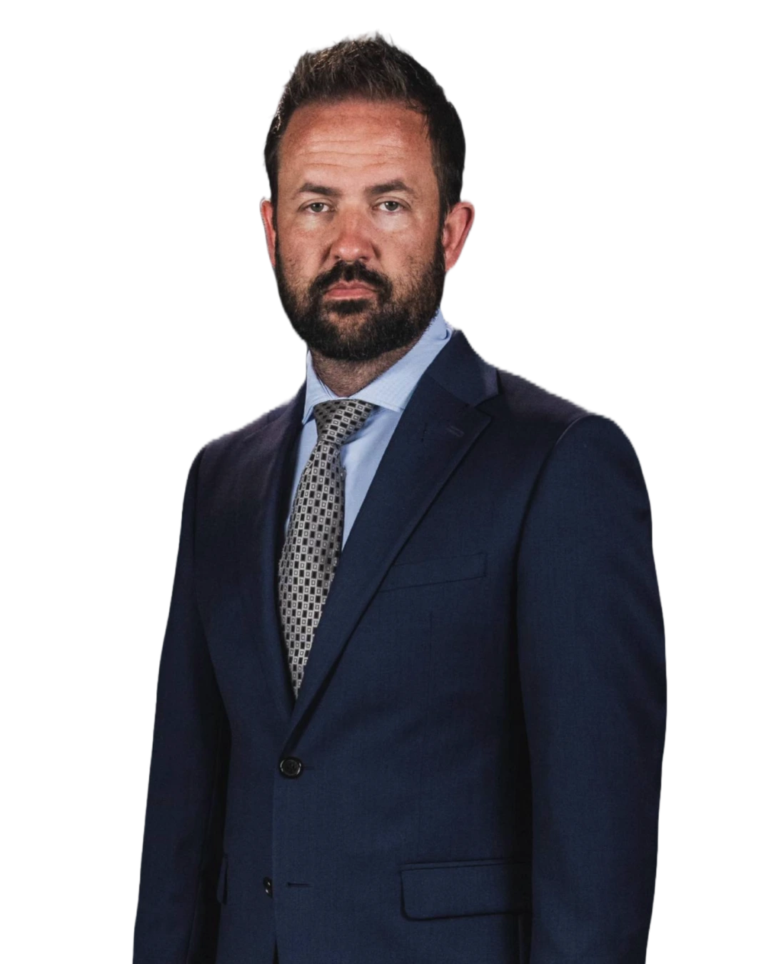 Portrait of Jacob Blizzard, partner at Blizzard & Zimmerman Attorneys in Abilene. He is wearing a dark suit jacket with a crisp dress shirt and tie, his light brown hair neatly styled. He gazes directly at the camera with a confident and composed expression - reflecting his expertise as a board-certified criminal defense and criminal appeals attorney serving clients in Texas.